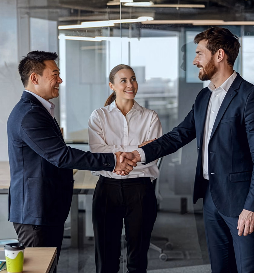 Healthcare billing partners shaking hands after aligning on faster reimbursements